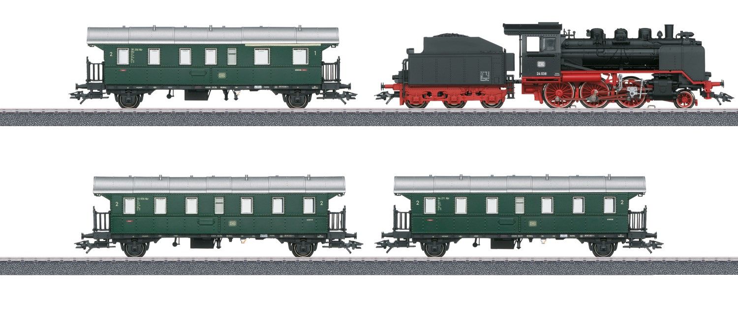 ohne Gleise und ohne Trafo bzw. Netzteil/Regler! Verpackt im Styroeinsatz. 1x Dampflok BR 24 DB Epoche III mit Wagner-Windleitblechen, 1x Donnerbüchse ABiwe 1./2. Klasse und 2x Donnerbüchse Bie 2. Klasse.
