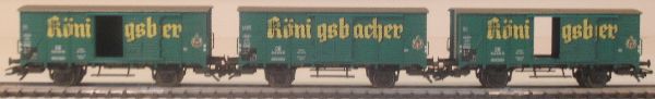 3 historische gedeckte Güterwagen G 10 der DB, Aufschrift Königsbacher LüP 332 mm