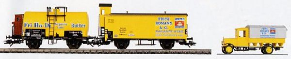 Wagen-Set Fritz Homann Dissen der DRG, Inhalt: 1 zweiachsiger Kesselwagen mit Bremserhaus, 1 gedeckter Güterwgaen mit Bremserhaus, 1 Oldtimer LKW. 3 Sammelbilder Homann. Aufschrift: Fritz Homann.