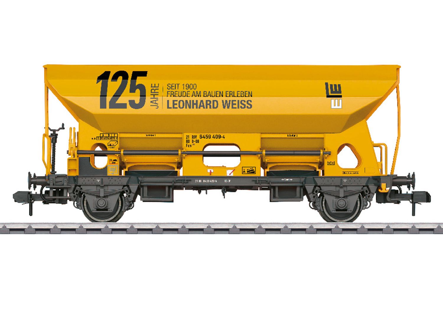 LIMITIERT! Drehschieber-Seitenentladewagen Fcs 092. Goldgelber Aufbau mit schwarzem Fahrwerk. Beschriftung am Oberkasten zum 125-jährigen Jubiläum der Firma Leonhard Weiss, Göppingen. Aktueller Betriebszustand 2024. Wagennummer 21 80 645 9 409