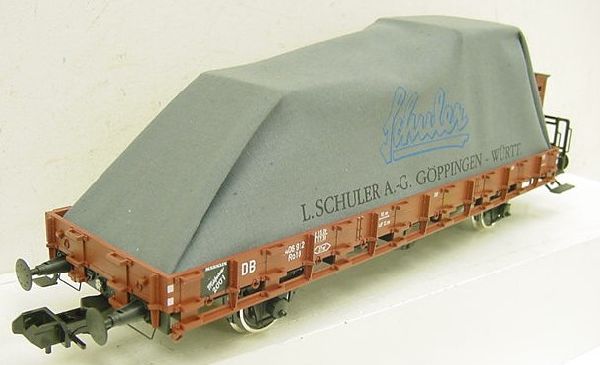 LIMITIERT. Schuler AG Göppingen/Württ. Rungenwagen Ro10 mit Bremserhaus, beladen mit Ladegutatrappe unter Textilplane