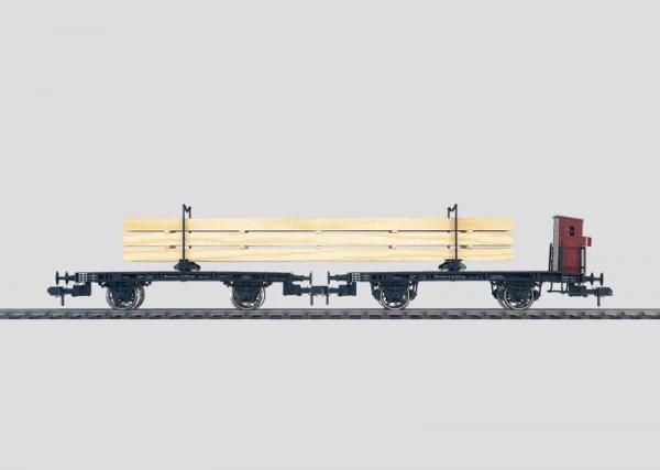 2 zweiachsige Drehschemelwagen beladen mit echtem Holz. Mit Bremserhaus. +  2  x  original Kupplung