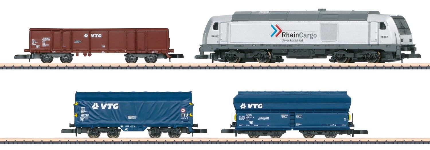 ohne Gleise und ohne Trafo bzw. Netzteil/Regler! 1 Diesellok BR 285 RheinCargo. 3 Güterwagen der VTG, davon 1x offener Güterwagen Typ Eaos, 1x Selbstentladewagen Typ Falns und 1x Schiebeplanenwagen Shimmns.